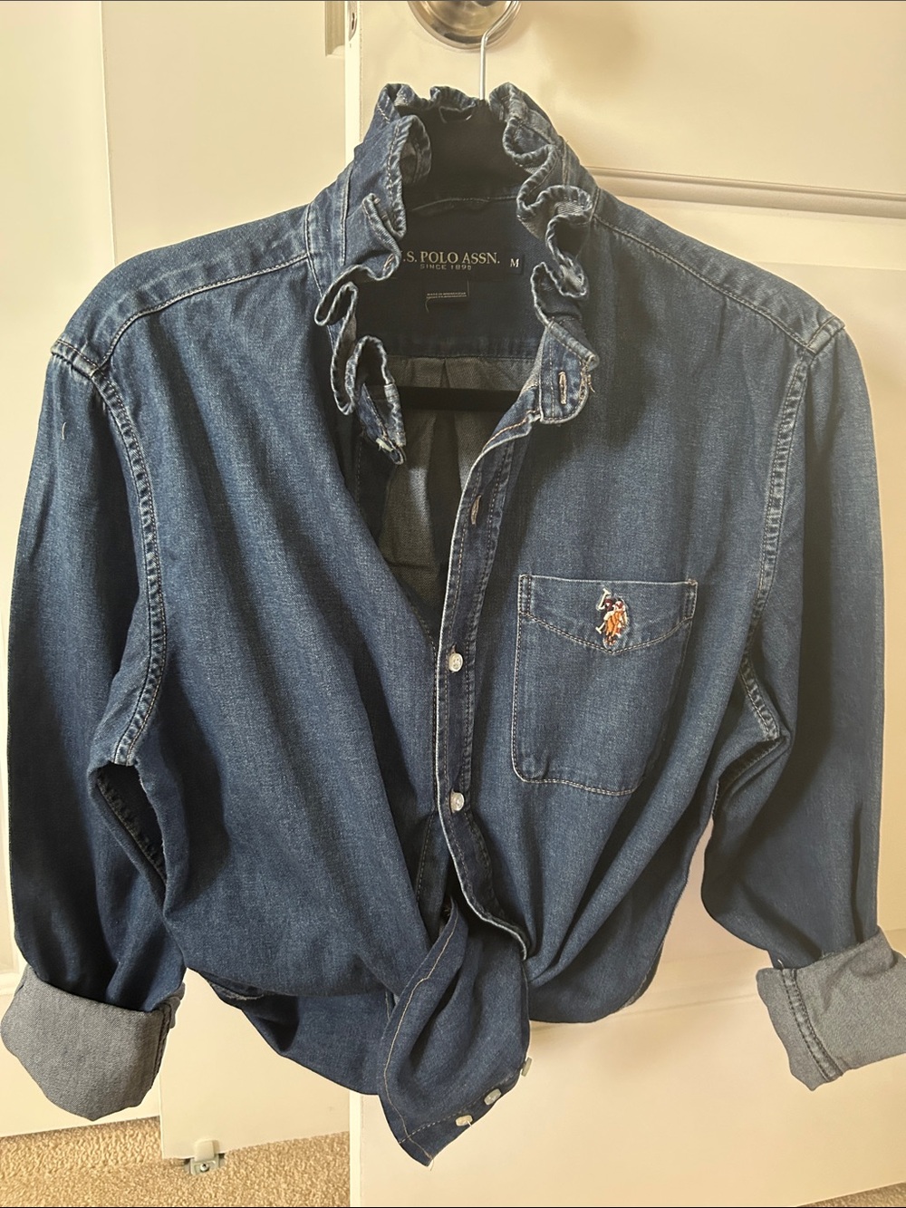 U.S. Polo Assn. Dark Blue Denim Shirt with ruffled collar recreated for a woman.